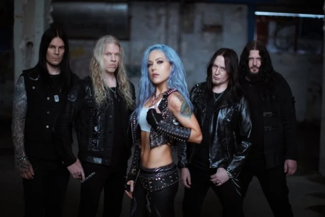 arch enemy,arch enemy deceivers,arch enemy band,arch enemy wacken,arch enemy lead singer, ARCH ENEMY Releases Music Video For ‘The Watcher’