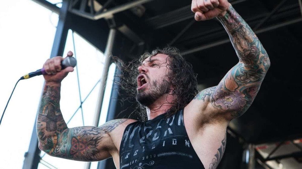 as i lay dying,tim lambesis,tim lambesis as i lay dying,tim lambesis wife,tim lambesis first wife,tim lambesis 2022,tim lambesis new wife, AS I LAY DYING Singer TIM LAMBESIS Reflects On Trying To Hire A Hitman To Kill His Ex-Wife